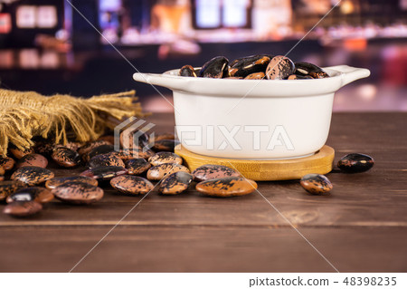 Speckled colored butter beans with restaurant 48398235