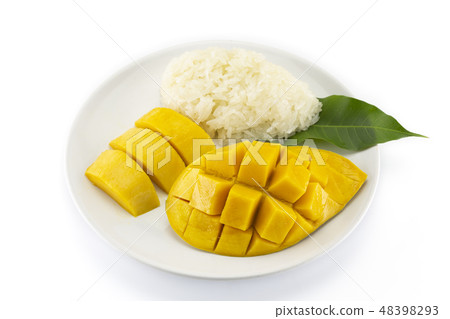 yellow Mango with sticky rice on a white plate  48398293