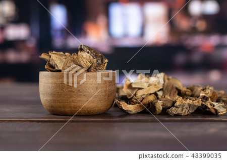 Dry brown mushroom boletus edulis with restaurant 48399035