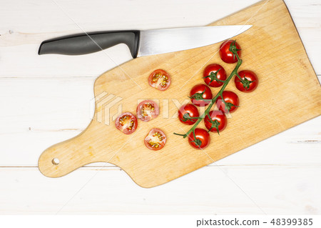 farfalle with arugula leaves on grey wood farfalle with arugula leaves on grey wood 48399385