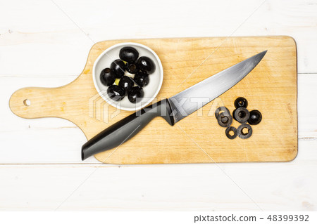 farfalle with arugula leaves on grey wood farfalle with arugula leaves on grey wood 48399392
