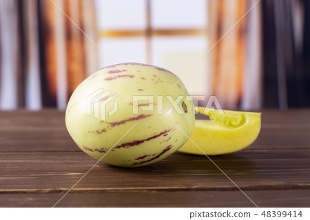 Fresh striped pepino melon with curtains 48399414