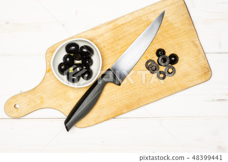 farfalle with arugula leaves on grey wood farfalle with arugula leaves on grey wood 48399441