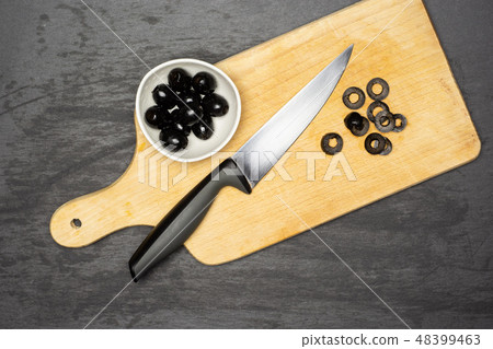 farfalle with arugula leaves on grey stone farfalle with arugula leaves on grey stone 48399463