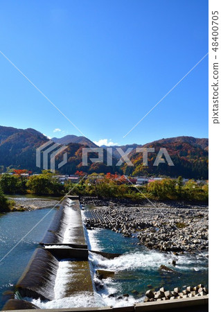 Ichinagawa and autumn leaves (Fukushima) 48400705