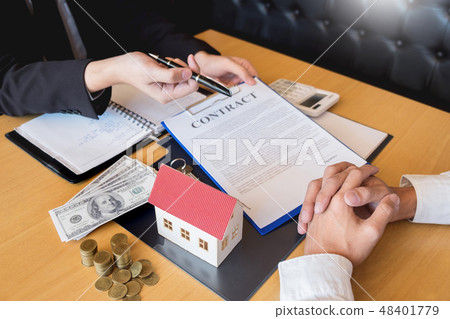 Real Estate developer Agent and sign on document giving keys of Real Estate developer Agent and sign on document giving keys of 48401779