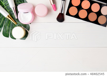 cosmetic and skin care product and green leaves 48402545