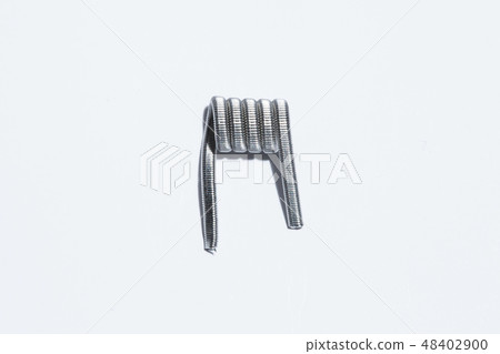 Coils for electronic cigarette close-up on a white background. Vape. Coils for electronic cigarette close-up on a white background. Vape. 48402900