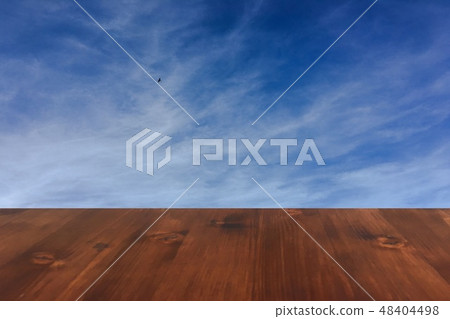 old brown oak wooden table on the blue sky clouds background, wood table old brown oak wooden table on the blue sky clouds background, wood table 48404498