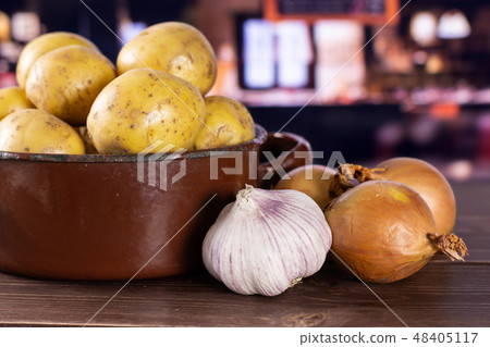 Recipe baked potatoes with onion with restaurant Recipe baked potatoes with onion with restaurant 48405117