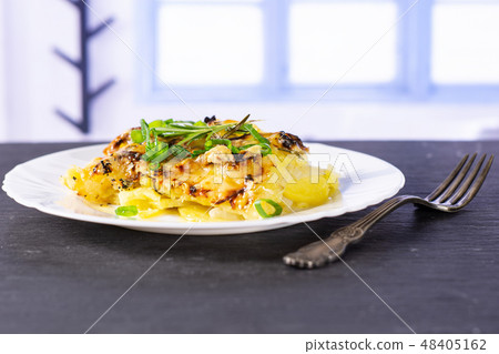 Recipe baked potatoes with onion with blue window Recipe baked potatoes with onion with blue window 48405162