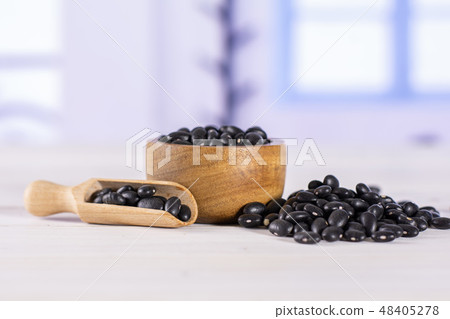 Raw black turtle beans with blue window Raw black turtle beans with blue window 48405278