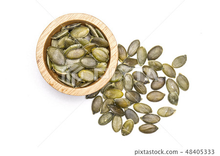 Hulled pumpkin seeds isolated on white 48405333