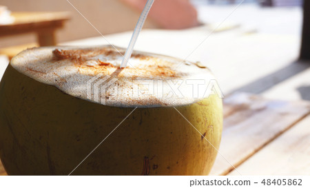 Coconut Water Drink on table with blurry background 48405862