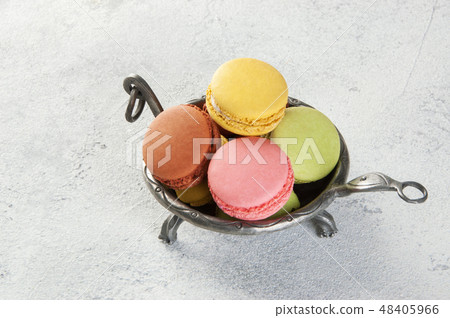Colorful macaroons on concret background Colorful macaroons on concret background 48405966
