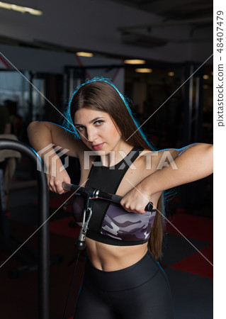 Very beautiful girl trains hands on blocks in the Very beautiful girl trains hands on blocks in the 48407479