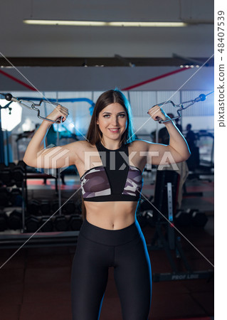 Very beautiful girl trains hands on blocks in the Very beautiful girl trains hands on blocks in the 48407539