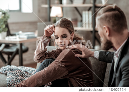 Teenager with black eye shades feeling stressed after argument Teenager with black eye shades feeling stressed after argument 48409534