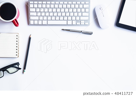 White desk office with laptop, smartphone and othe White desk office with laptop, smartphone and othe 48411727