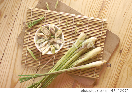 Lemon grass with lemon grass sliced on top choppin Lemon grass with lemon grass sliced on top choppin 48412075