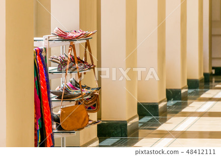 Shelving unit with handcrafted accessories. India. 48412111