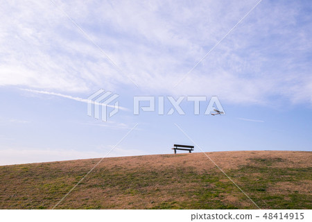 Hill with bench 48414915