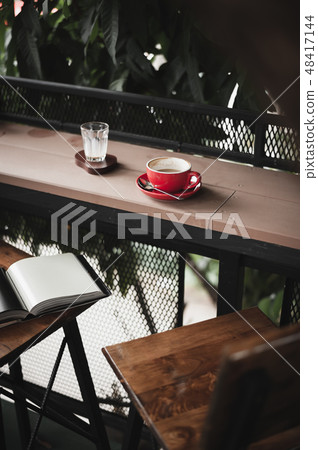 Hot coffee on table with abstract emotion Hot coffee on table with abstract emotion 48417144