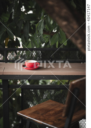Hot coffee on table with abstract emotion Hot coffee on table with abstract emotion 48417147