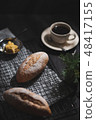 baguette on blue wood table 48417155