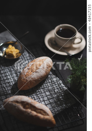 baguette on blue wood table 48417155