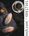 baguette on blue wood table 48417161