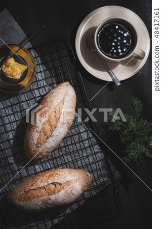 baguette on blue wood table 48417161