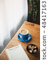 Hot coffee on table with abstract emotion 48417163