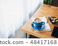 Hot coffee on table with abstract emotion 48417168