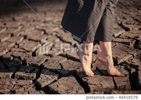 Heat shattered earth in the desert 48418579