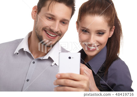 Young couple take selfie, studio isolated shoot 48419716
