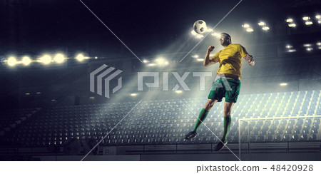 Soccer forward player 48420928