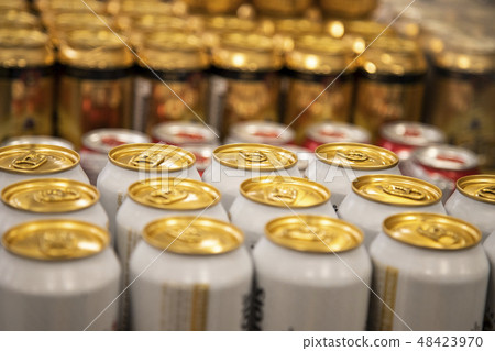 Canned beer with golden yellow lid 48423970