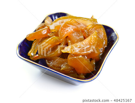 Pear jam in a ceramic dish. Isolated on white Pear jam in a ceramic dish. Isolated on white 48425167