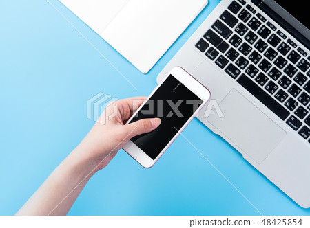 Female hand-held machine Smartphone electronic wallet with online payment mockup Female hand-held machine Smartphone electronic wallet with online payment mockup 48425854