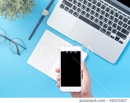 Female hand-held machine Smartphone electronic wallet with online payment mockup Female hand-held machine Smartphone electronic wallet with online payment mockup 48425867