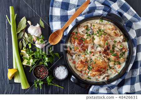 chicken fricassee in a dutch oven, top view chicken fricassee in a dutch oven, top view 48426631