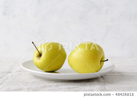 Imperfect ugly misshapen fresh golden apples Imperfect ugly misshapen fresh golden apples 48426818