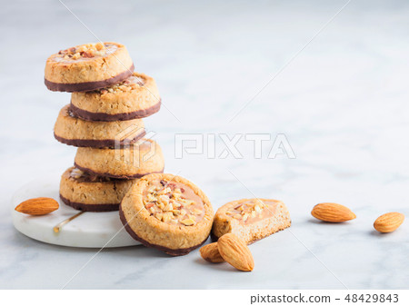 Homemade biscuit cookies with almond nuts Homemade biscuit cookies with almond nuts 48429843