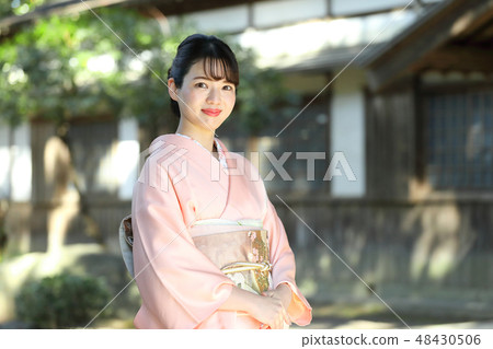 A woman in kimono shape A woman in kimono shape 48430506