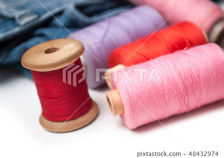 sewing thread spool bobbin on white background sewing thread spool bobbin on white background 48432974