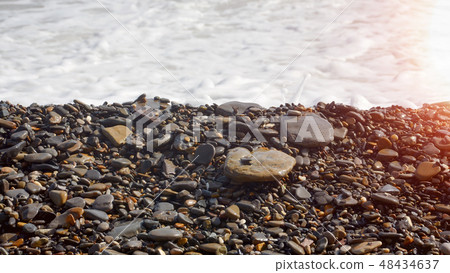 large stones on the background of the sea foam large stones on the background of the sea foam 48434637