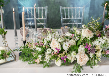 Floral decoration for wedding ceremony romance dining. Wedding banquet , festive decor. Bouquet from Floral decoration for wedding ceremony romance dining. Wedding banquet , festive decor. Bouquet from 48436612