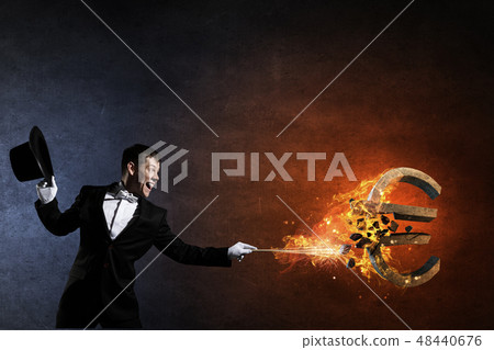 Man magician with cylinder hat Man magician with cylinder hat 48440676