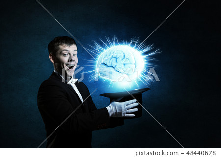 Man magician with cylinder hat Man magician with cylinder hat 48440678